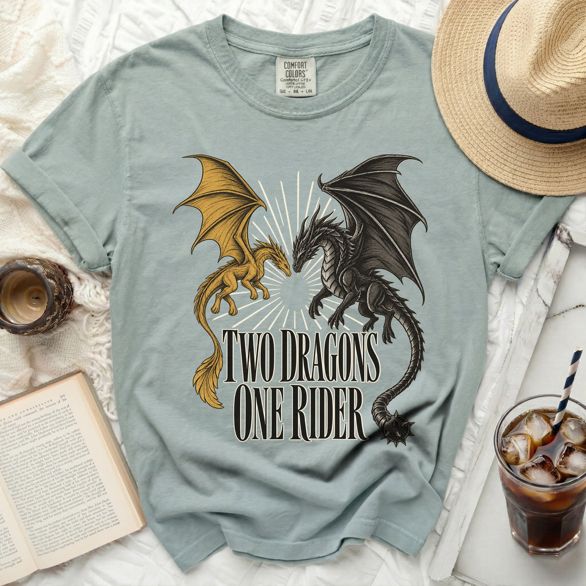 Light blue t-shirt with yellow and black dragons and "TWO DRAGONS ONE RIDER" text.