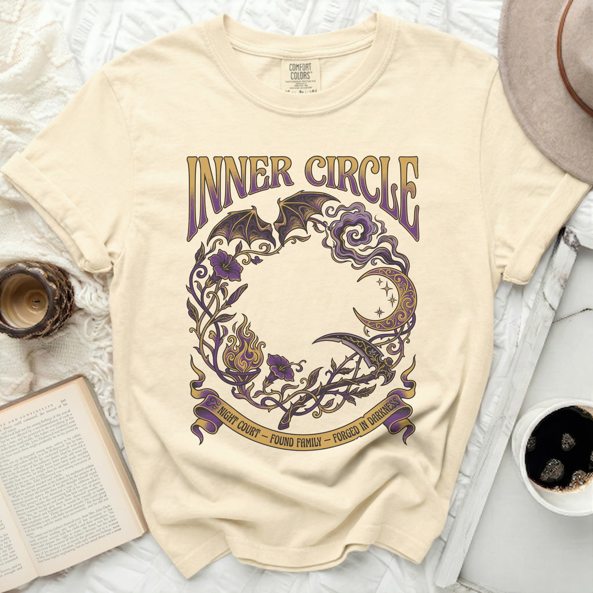Cream t-shirt with "Inner Circle" text and a dark floral design.