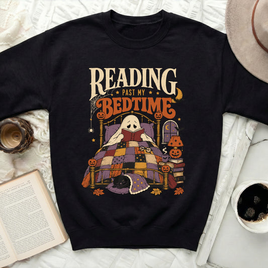 Ghost in bed reading, "Reading Past My Bedtime" text, black cat.