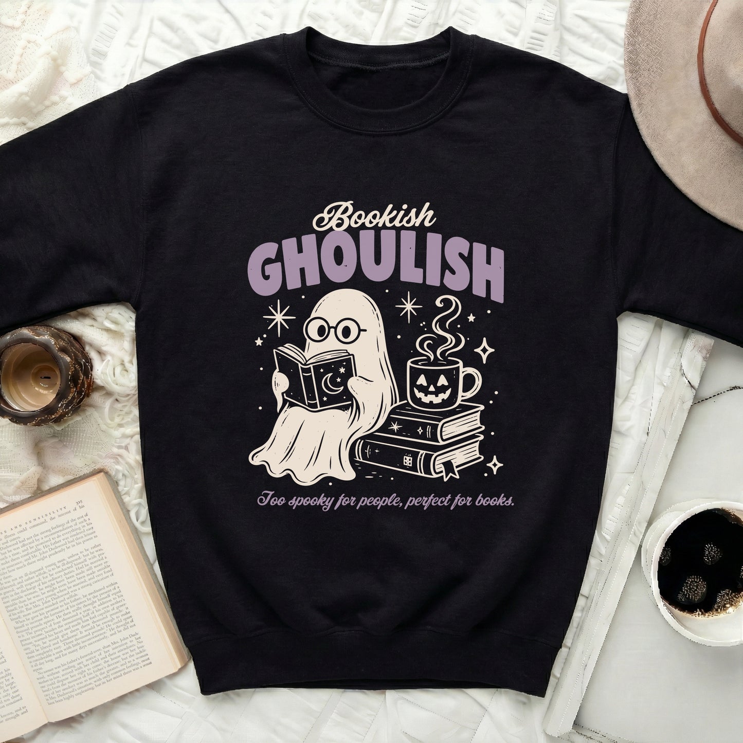 Black sweatshirt with ghost reading books, coffee, and text.
