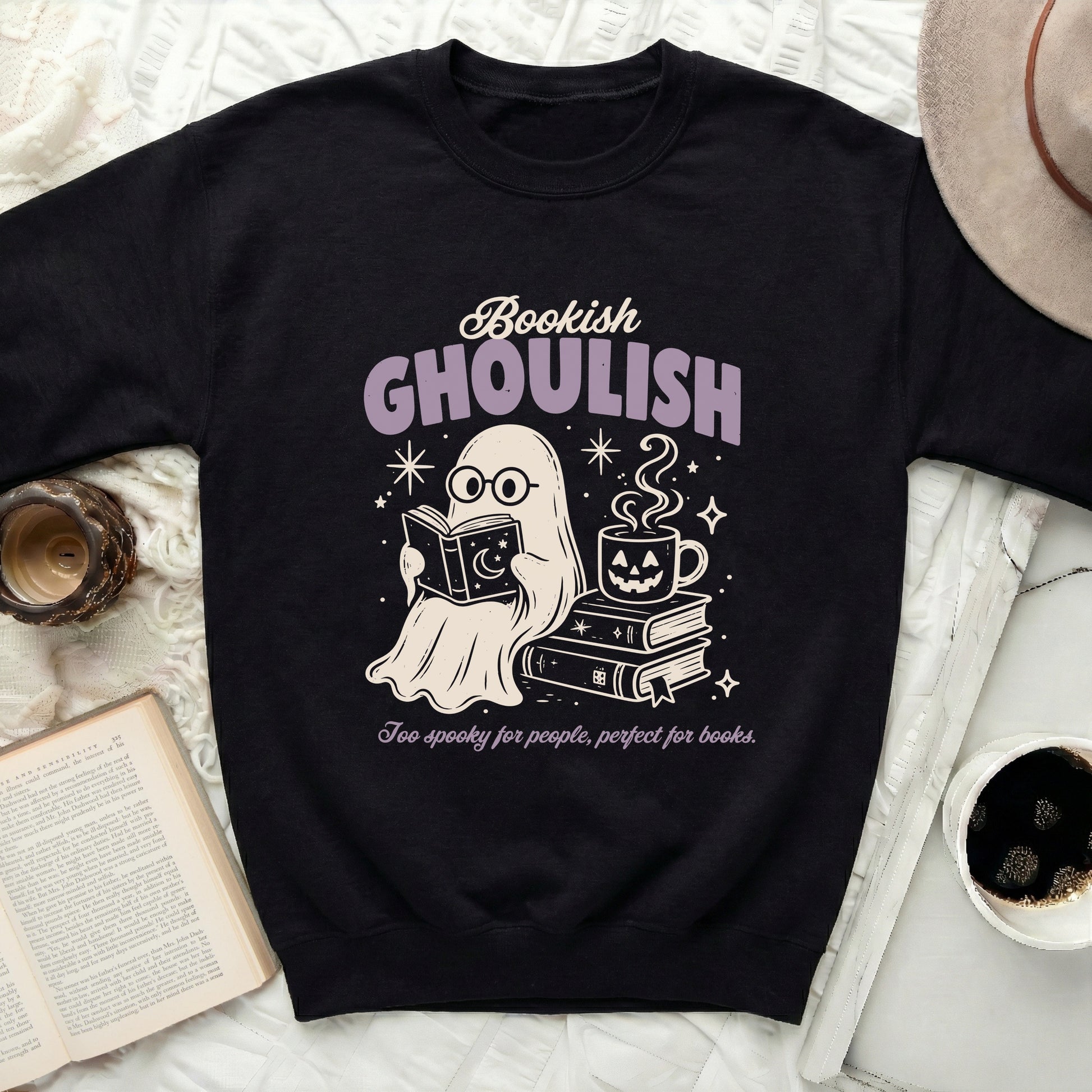 Black sweatshirt with ghost reading books, coffee, and text.