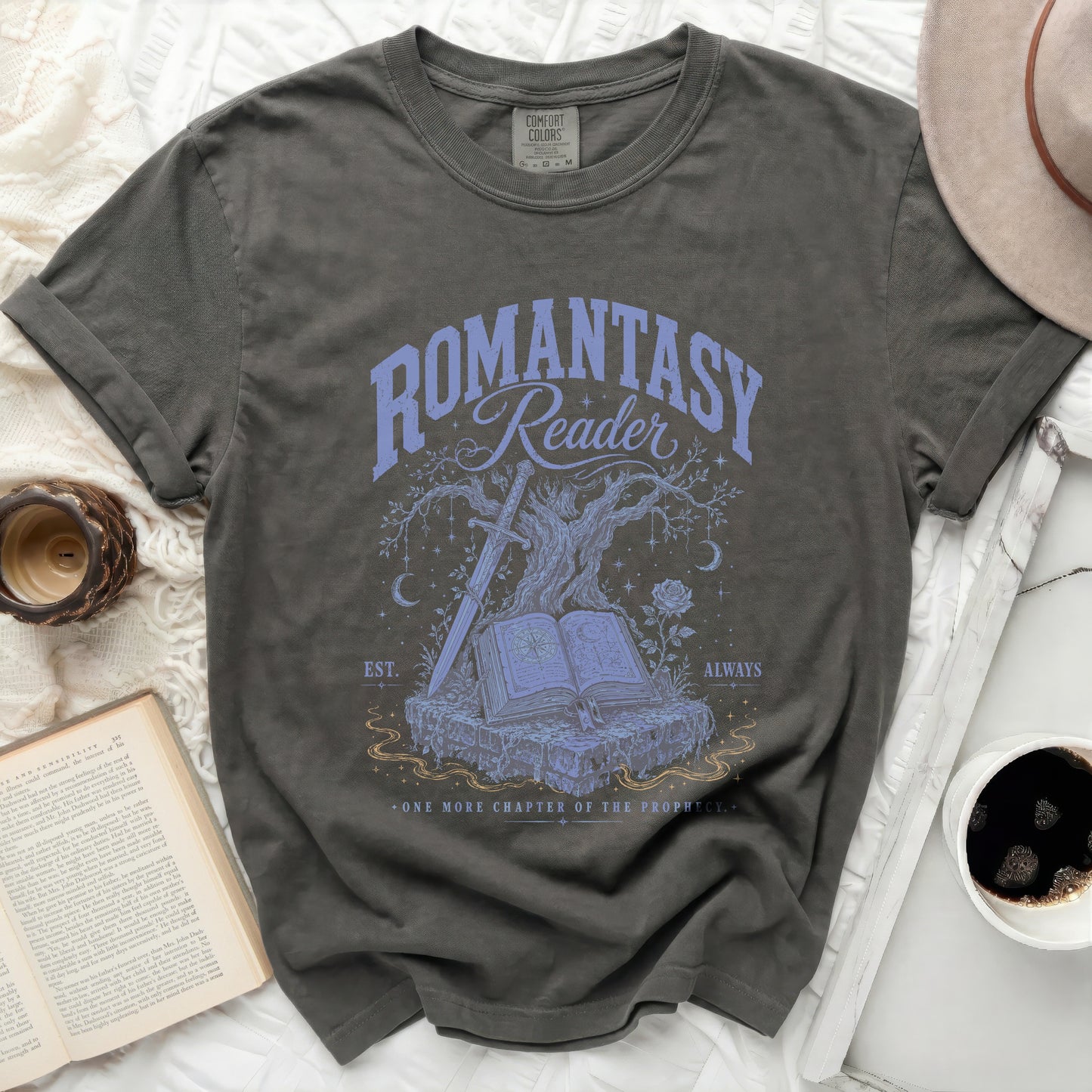 Dark grey t-shirt with "Romantasy Reader" graphic of a book, sword, and tree.
