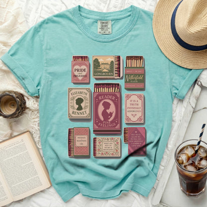 T-shirt with illustrations of matchbox covers inspired by classic novels.