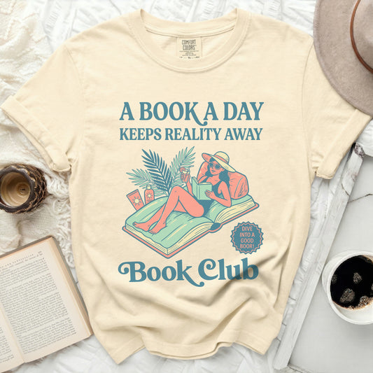 Cream t-shirt with "A Book a Day Keeps Reality Away" and "Book Club" text.