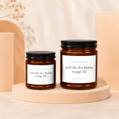 Two amber glass jars with black lids and white labels on a neutral beige pedestal.