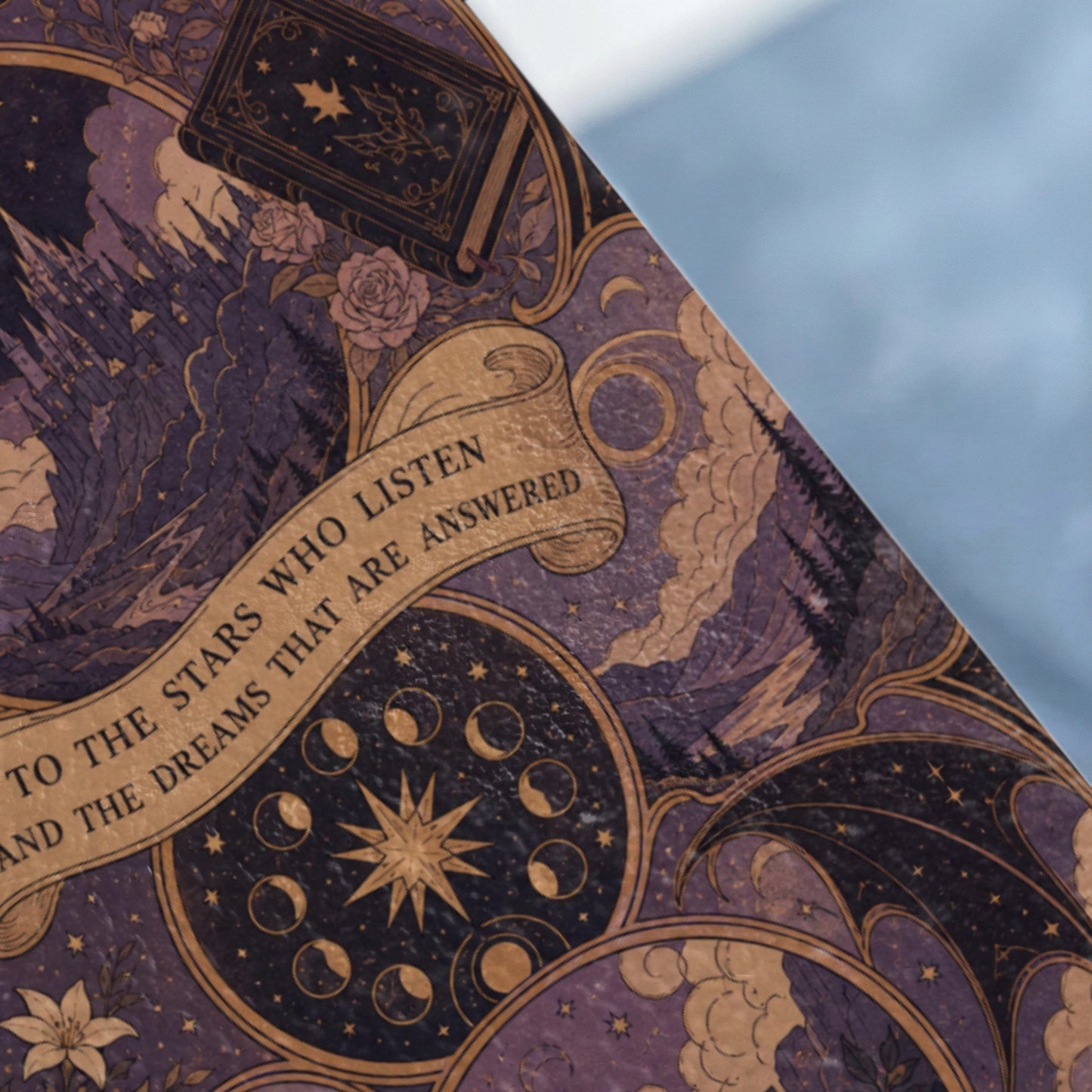Book cover with mystical illustration: castle, roses, moon phases, and quote.