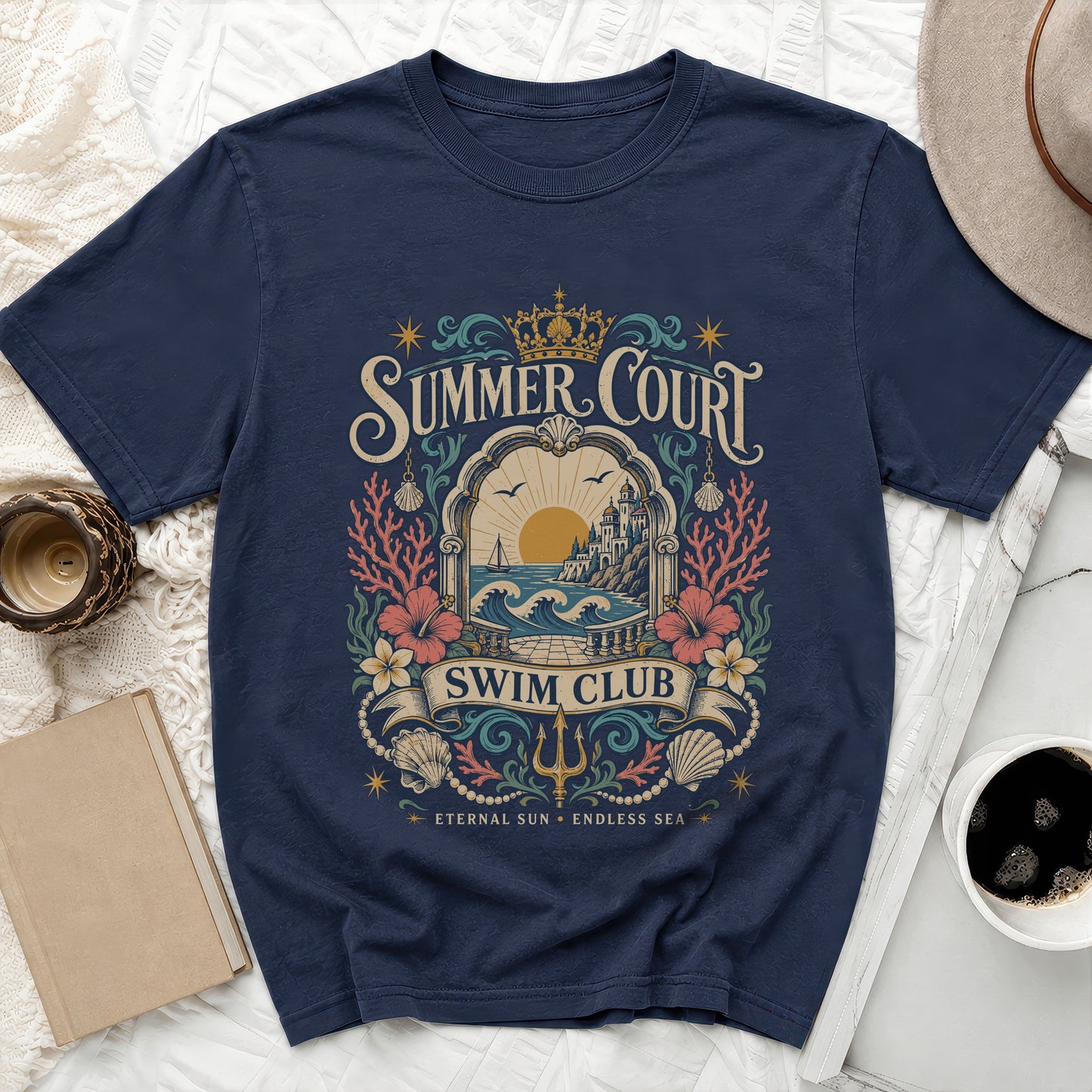 Navy t-shirt with "Summer Court Swim Club" text and seaside illustration.