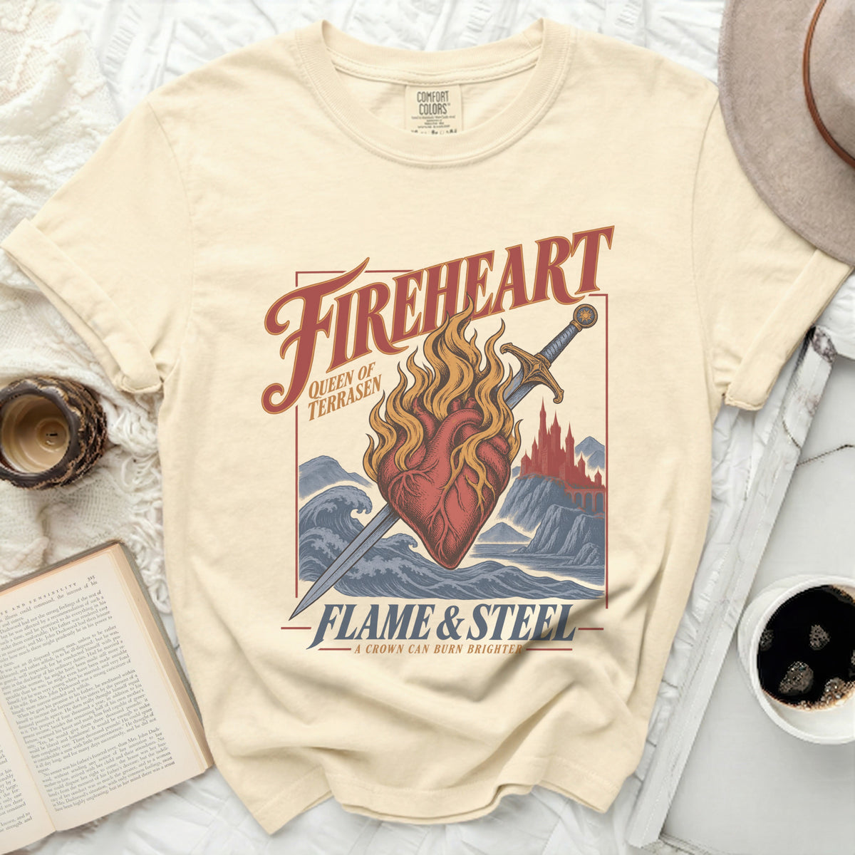 Cream t-shirt with "Fireheart Queen of Terrasen Flame & Steel" graphic and sword through heart.