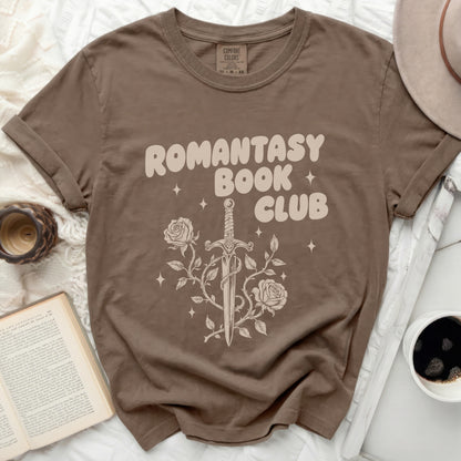 Brown t-shirt with "Romantasy Book Club" text and sword with roses design.
