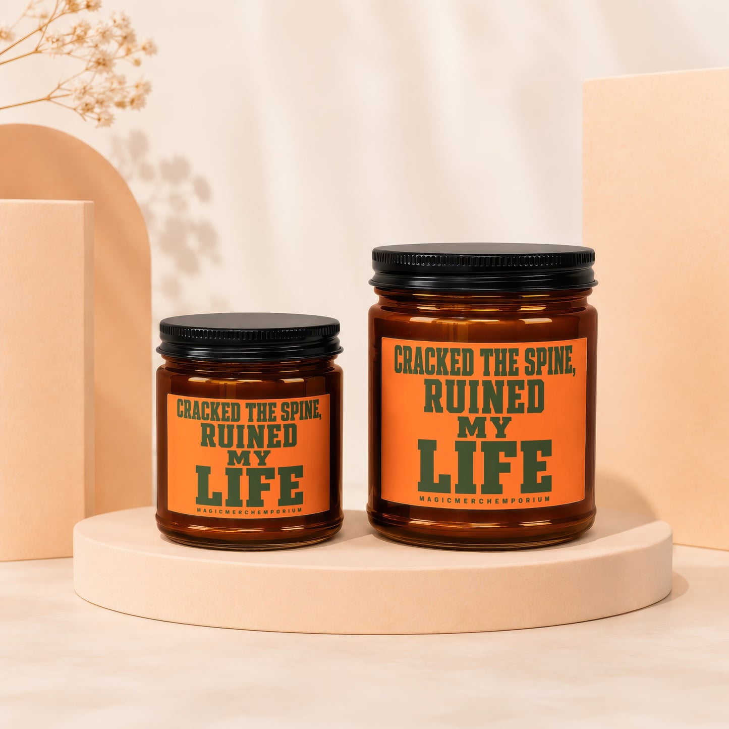 Two brown glass jars with lids, one larger, feature orange labels with green text.