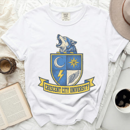 White t-shirt with Crescent City University crest featuring wolf and moon.