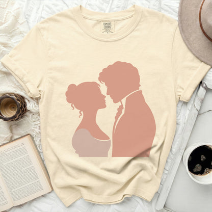 Cream t-shirt with peach silhouette of a couple looking at each other.