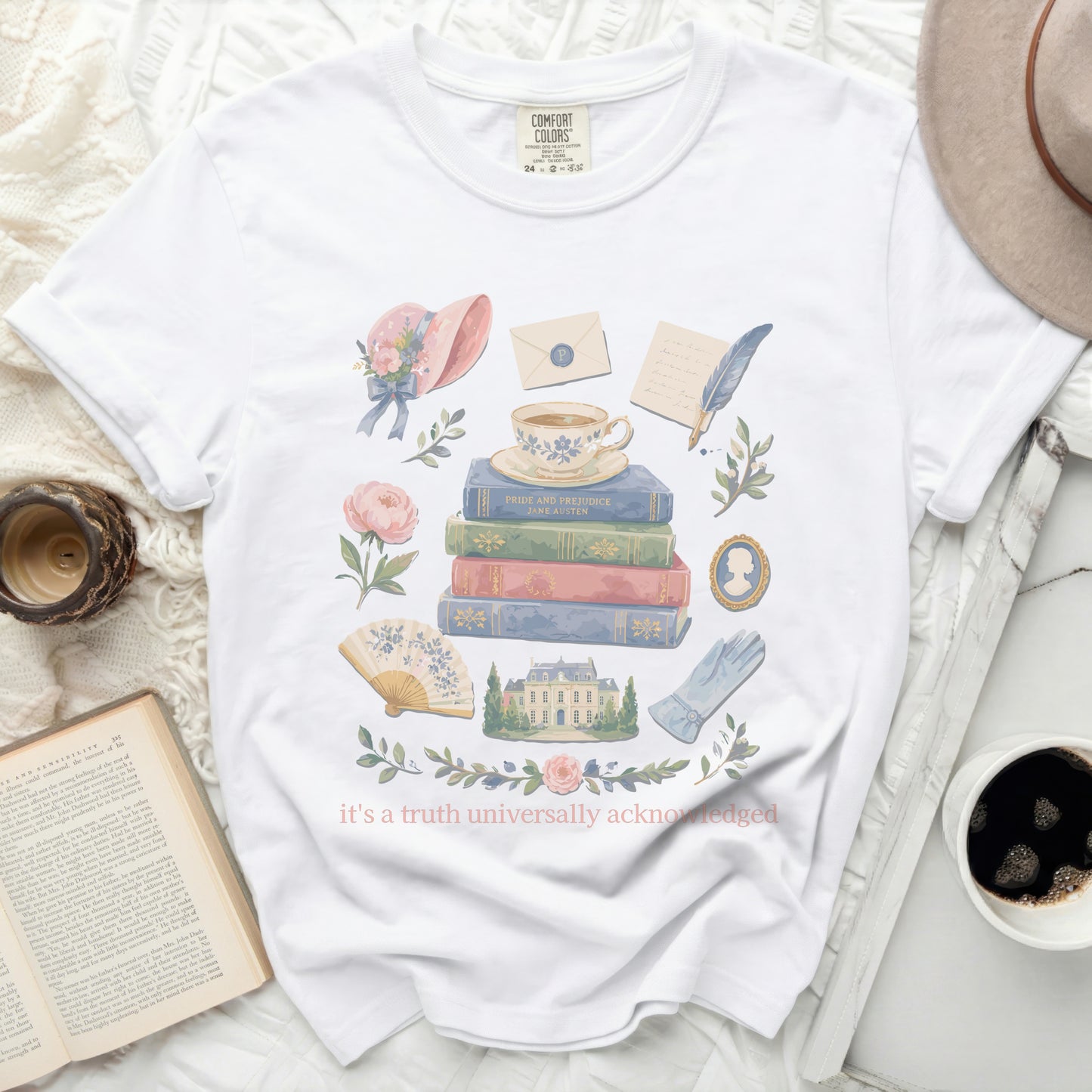 White t-shirt with "Pride and Prejudice" book stack graphic and text.