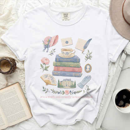 White t-shirt with "Pride and Prejudice" book stack graphic and text.