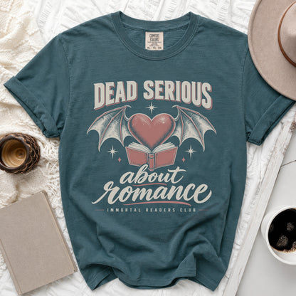 Teal t-shirt with "Dead Serious about romance" text and gothic heart design.