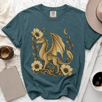 Teal t-shirt with a gold dragon surrounded by flowers and a crescent moon.