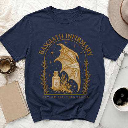 Navy blue short-sleeve t-shirt with a gold graphic of a bat wing, potion bottle, and text reading Basgiath Infirmary.