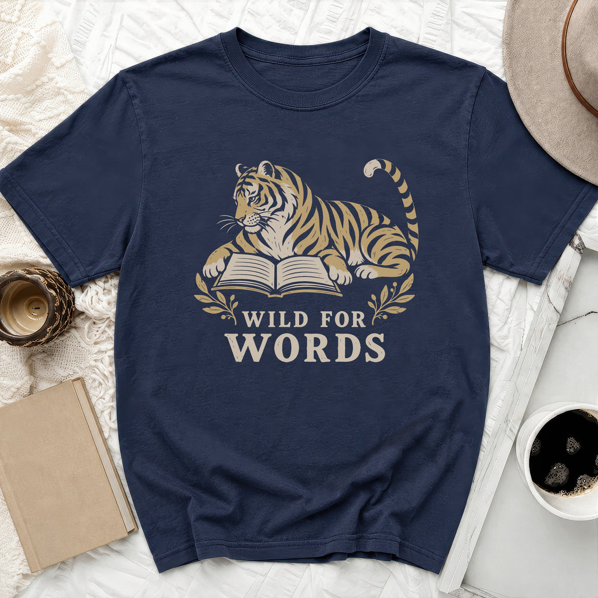Navy t-shirt with tiger reading a book and text "Wild for Words".