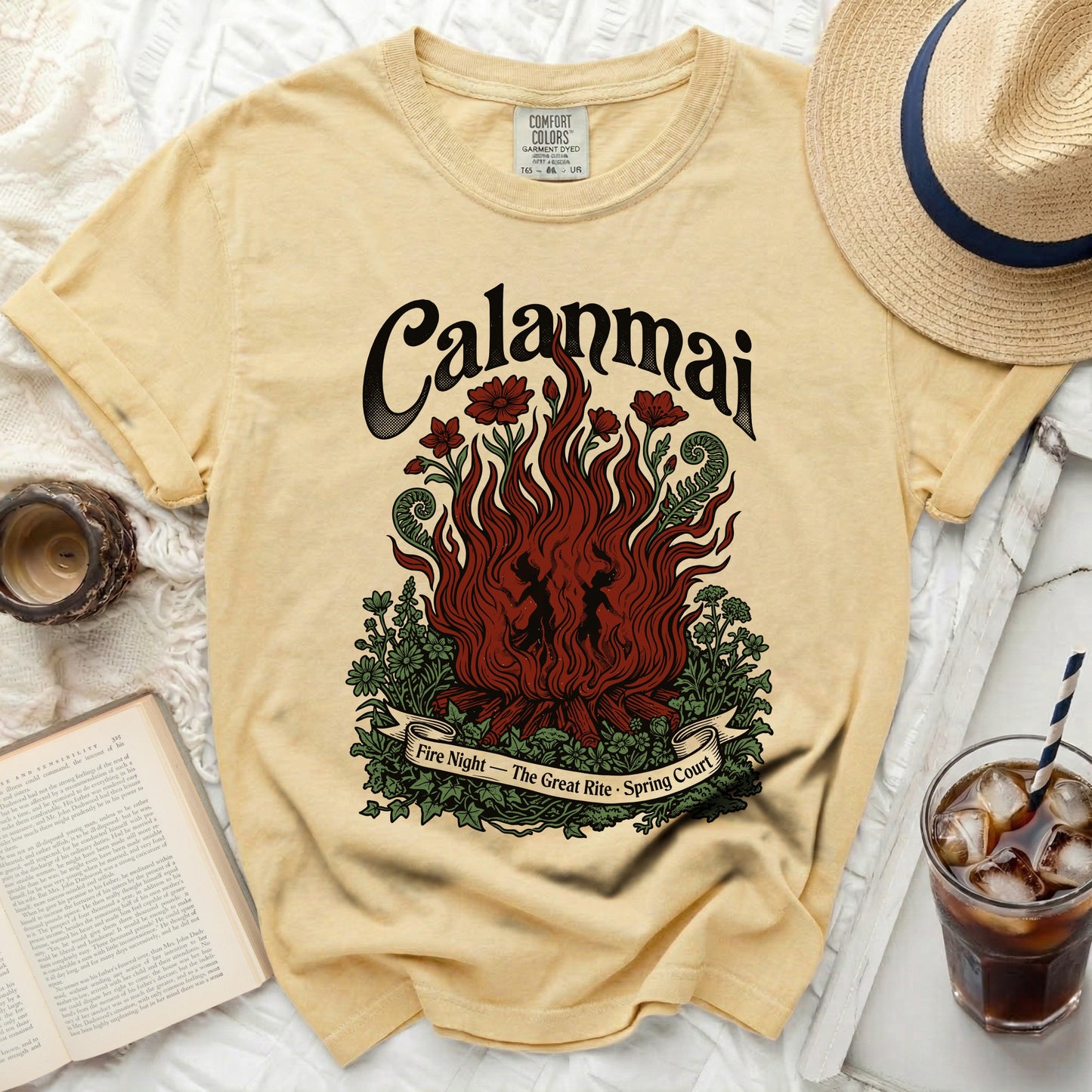Yellow Comfort Colors t-shirt with "Calanmai Fire Night" graphic and ribbon.