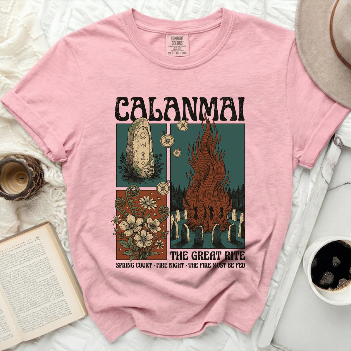Pink t-shirt with "CALANMAI THE GREAT RITE" graphic and text.