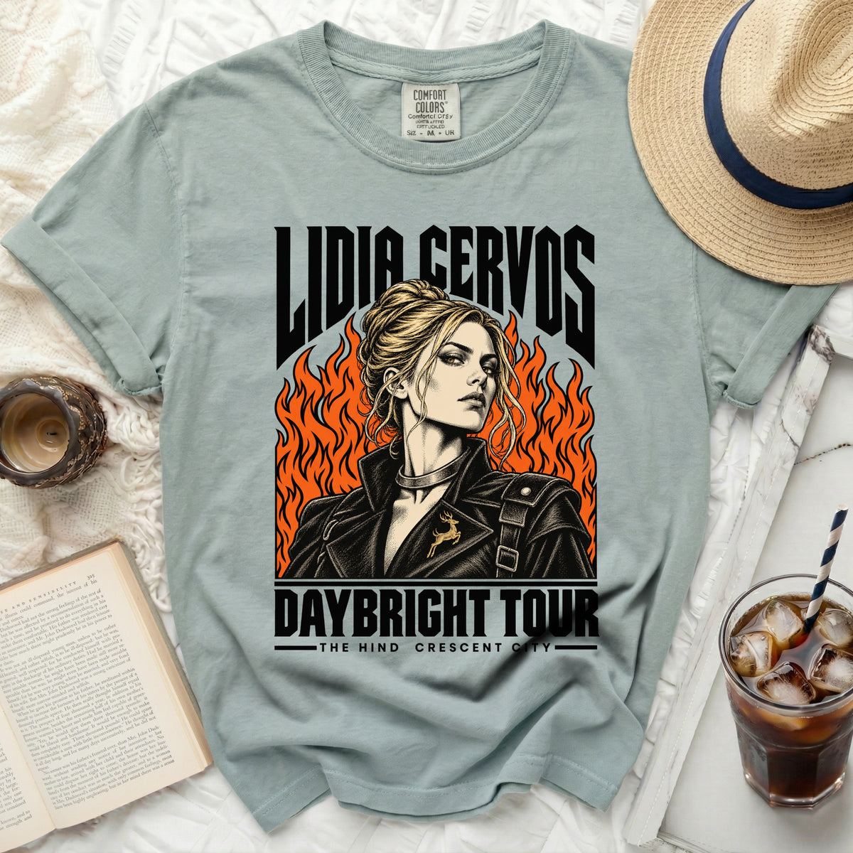 Lidia Cervos Daybright Tour graphic t-shirt with flames and a woman's portrait.