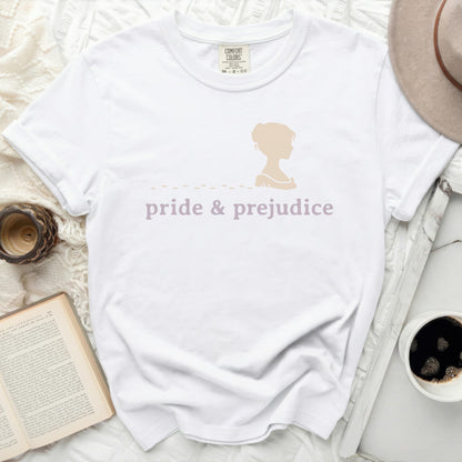 White t-shirt with "Pride & Prejudice" and silhouette of a woman.