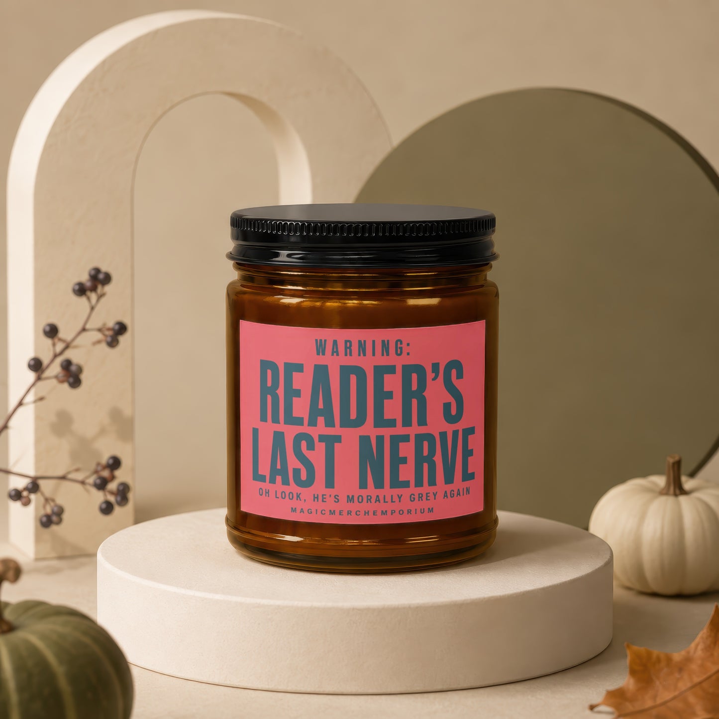Amber candle with black lid, pink label reads: "READER'S LAST NERVE".