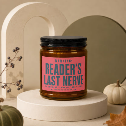 Amber candle with black lid, pink label reads: "READER'S LAST NERVE".