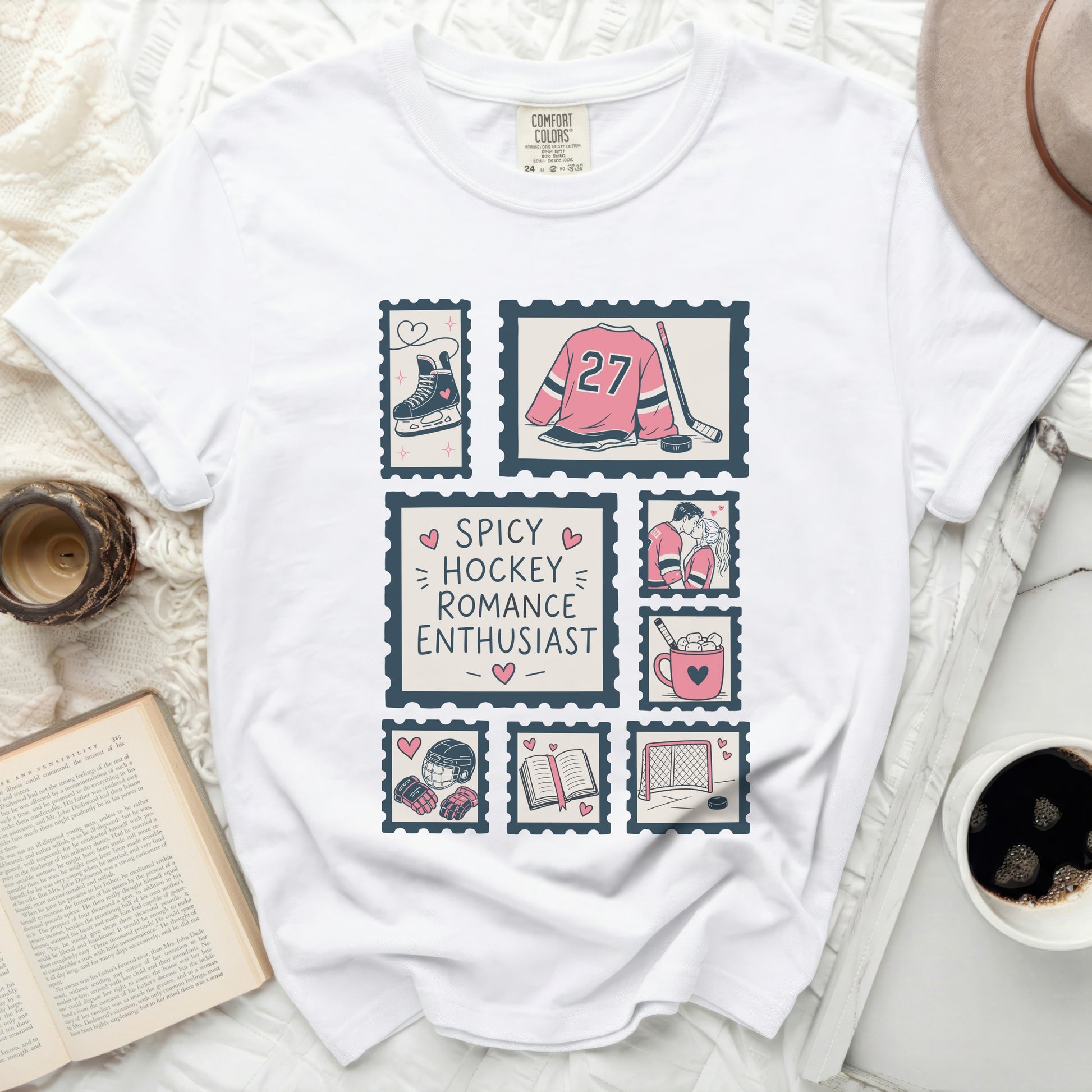 White t-shirt with vintage postage stamp graphics and "Spicy Hockey Romance Enthusiast" text.