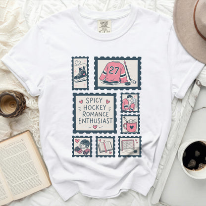 White t-shirt with vintage postage stamp graphics and "Spicy Hockey Romance Enthusiast" text.