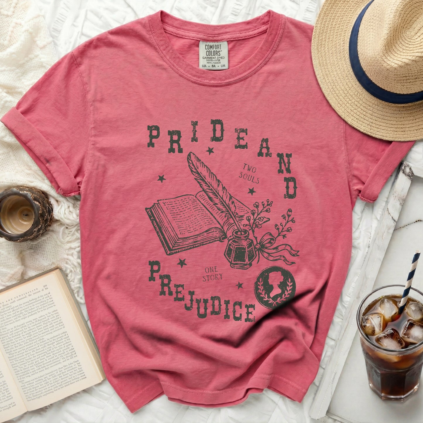 T-shirt with "Pride and Prejudice" and quill graphic.