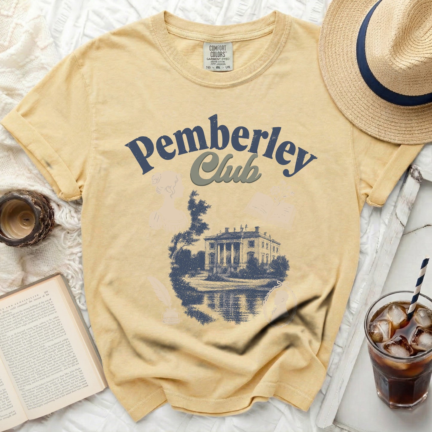 Yellow t-shirt with "Pemberley Club" and a sketch of Pemberley house.