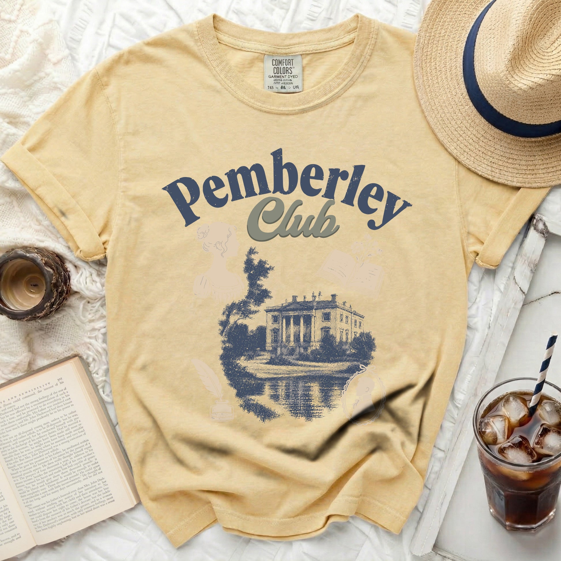 Yellow t-shirt with "Pemberley Club" and a sketch of Pemberley house.