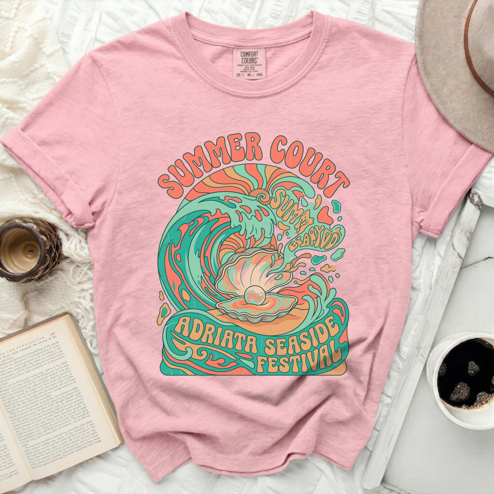 Pink t-shirt with "Summer Court Adriata Seaside Festival" wave graphic.