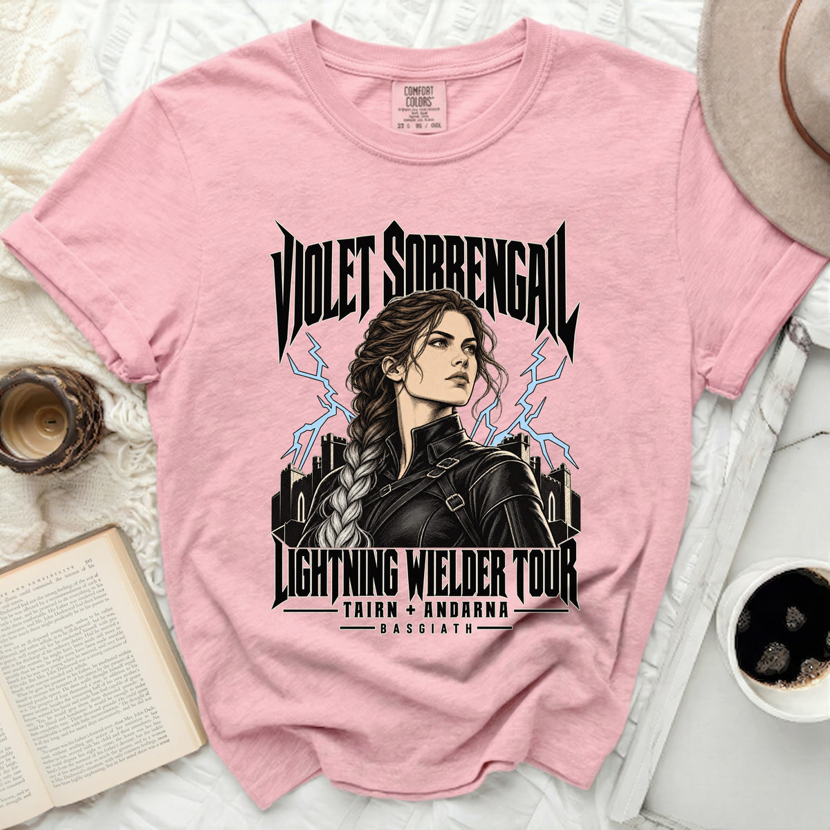 Pink t-shirt with "Violet Sorrengal Lightning Wielder Tour" graphics.