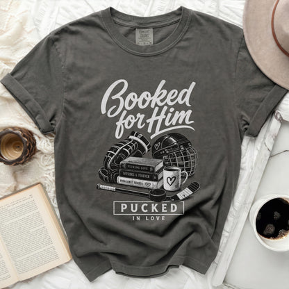 Dark grey t-shirt with "Booked for Him" and hockey graphics.