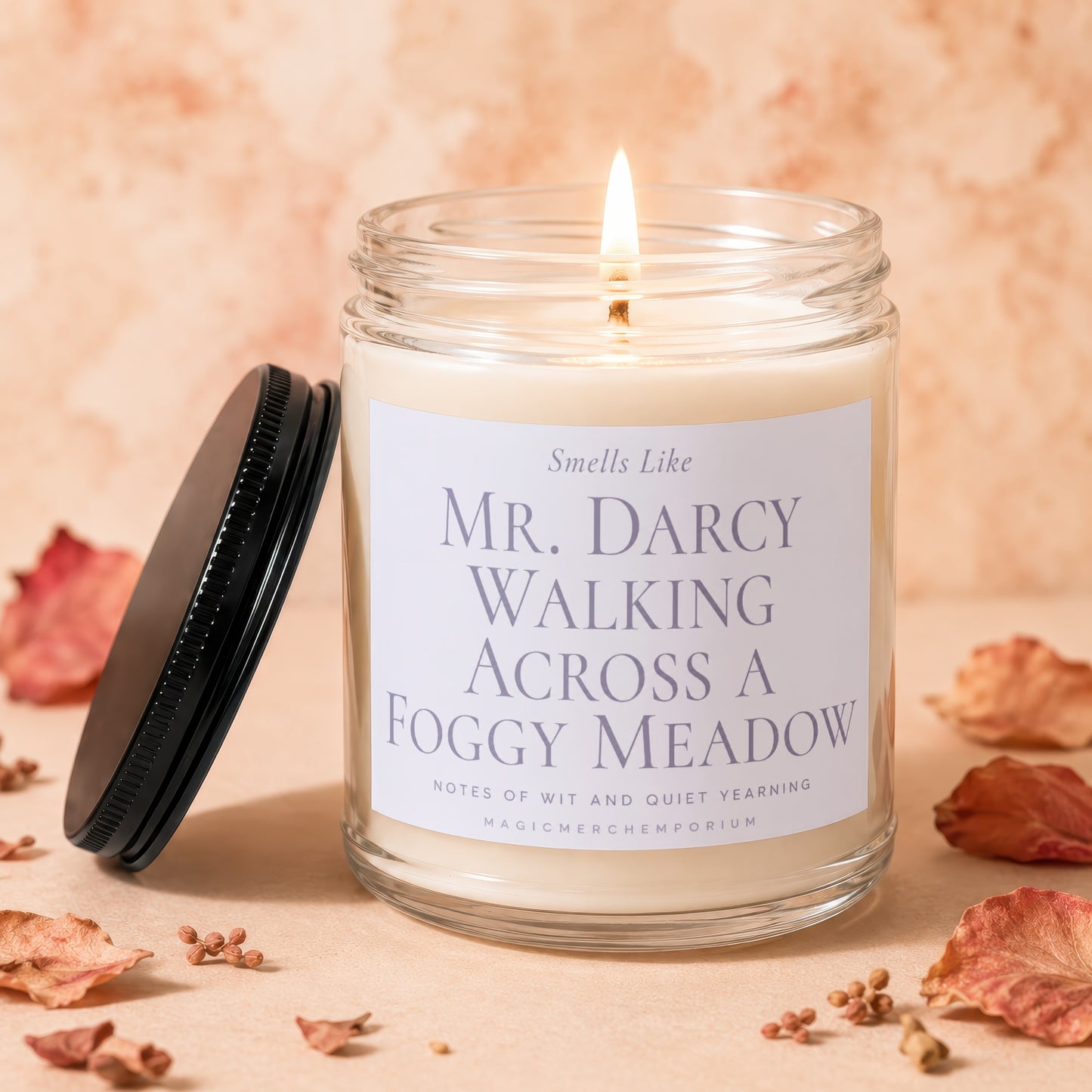 Candle labeled "Mr. Darcy Walking Across a Foggy Meadow" with a burning wick.