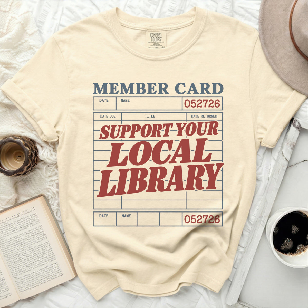 Cream t-shirt with "Member Card" and "Support Your Local Library" text.