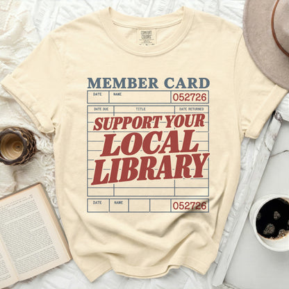 Cream t-shirt with "Member Card" and "Support Your Local Library" text.