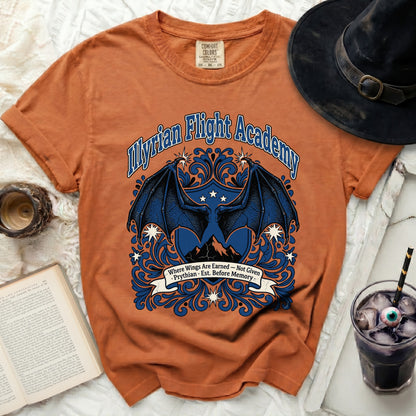 Orange t-shirt with "Myrian Flight Academy" and dragon wings logo.