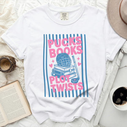 T-shirt with "Pucks Books Plot Twists" text and hockey illustration.