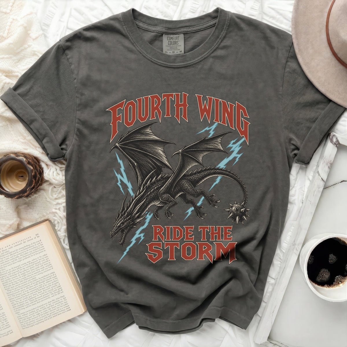 Dark gray t-shirt with dragon graphic and "Fourth Wing Ride The Storm" text.