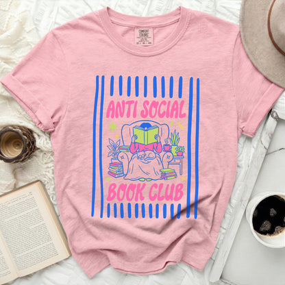 Pink t-shirt with "Anti Social Book Club" text and a person reading.