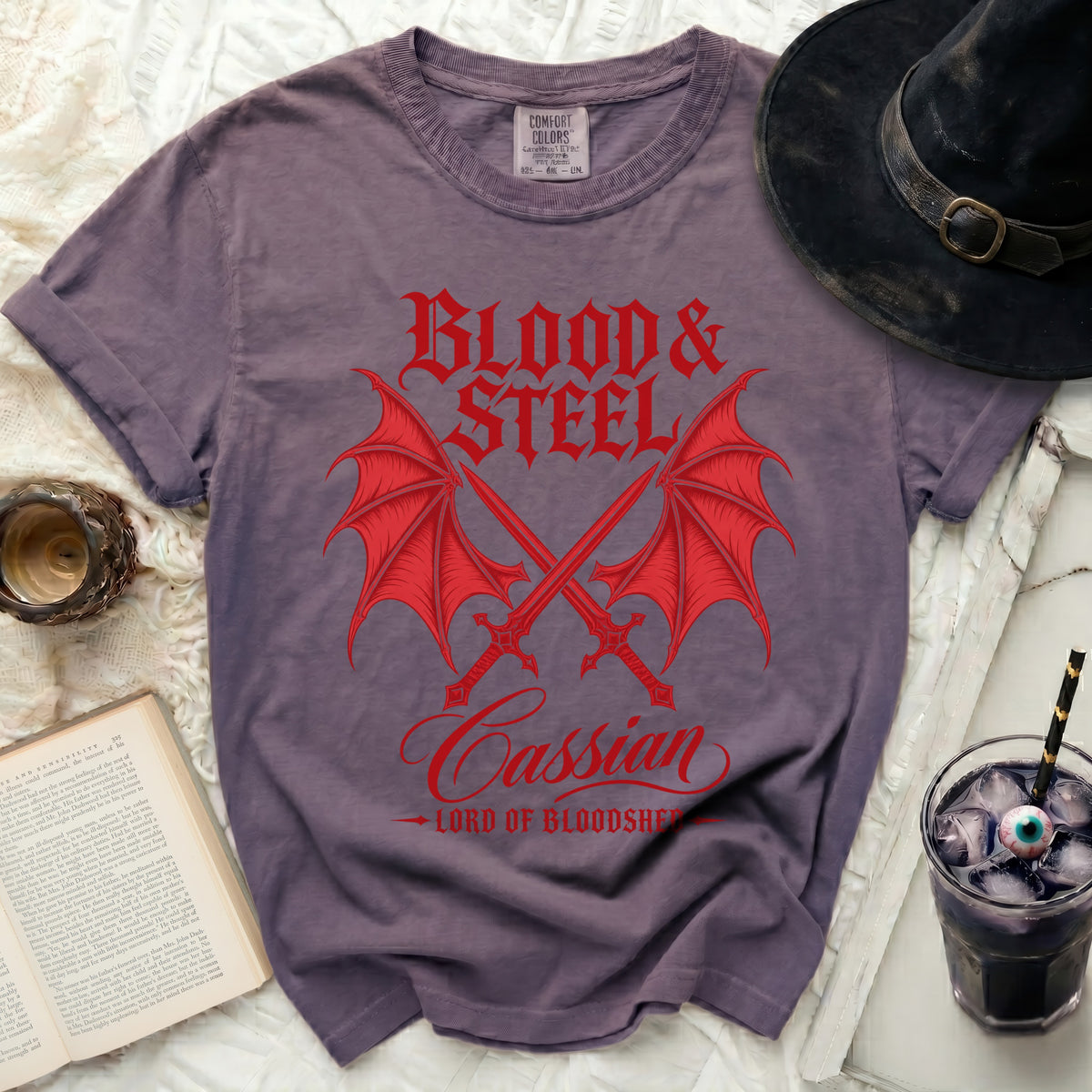 Purple t-shirt with red "Blood & Steel" graphic featuring dragon wings and swords.
