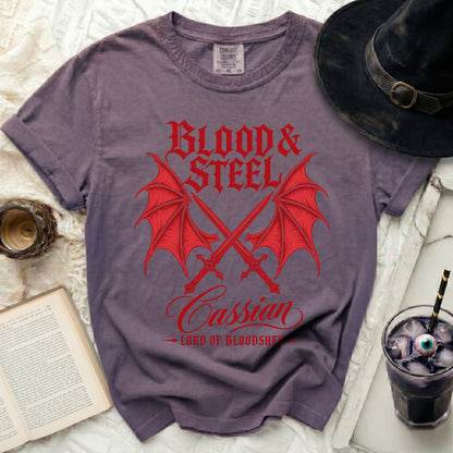 Purple t-shirt with red "Blood & Steel" graphic featuring dragon wings and swords.
