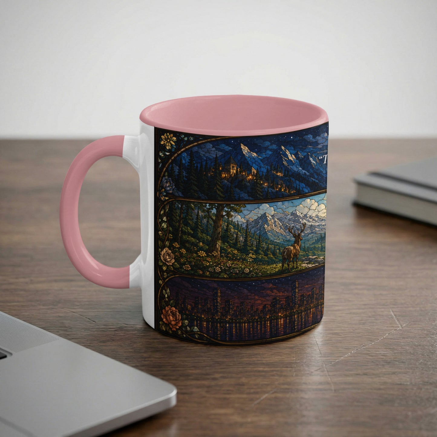 Mug with stained glass scenes of mountains, a deer, and a city skyline.