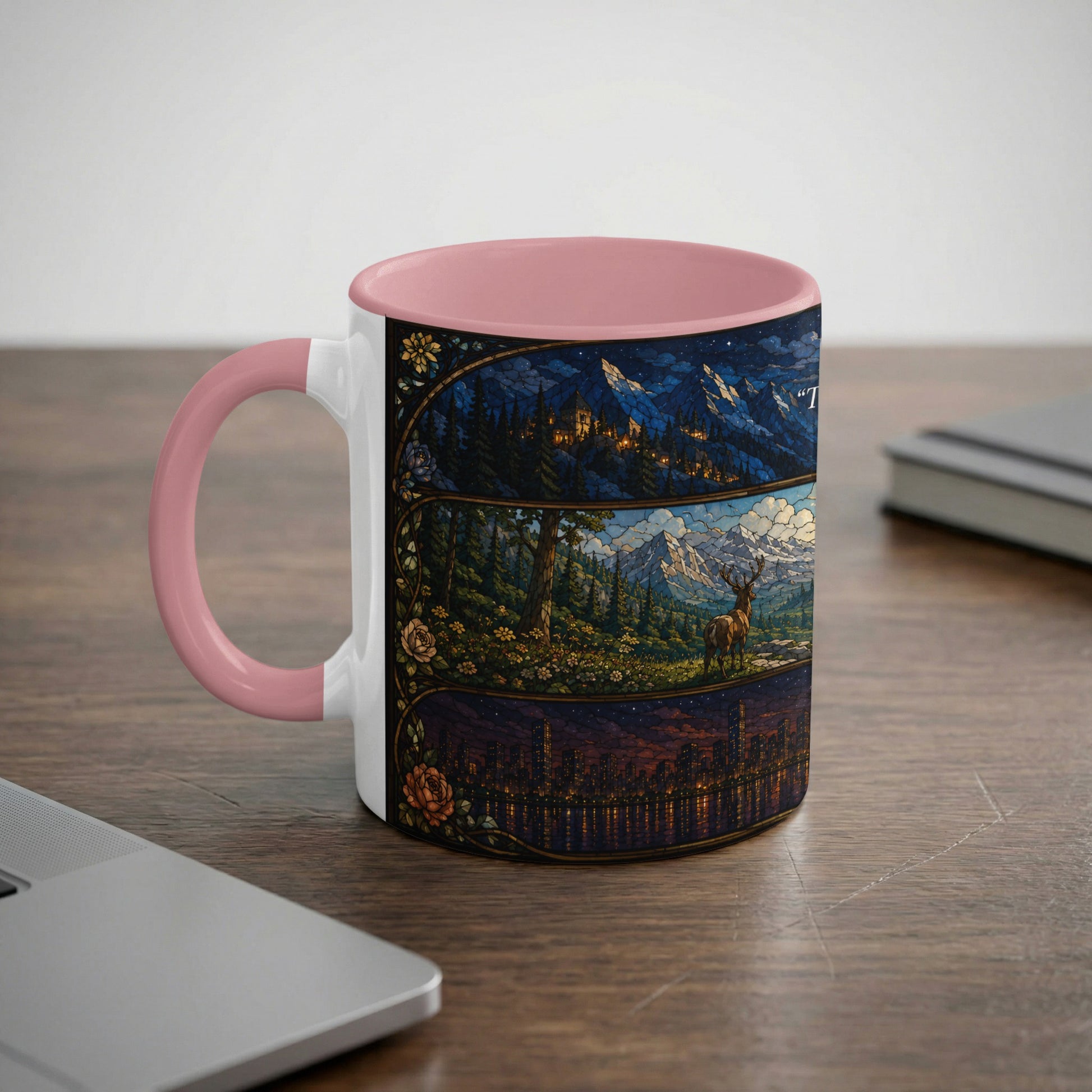 Mug with stained glass scenes of mountains, a deer, and a city skyline.