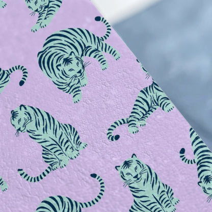 Pattern of stylized tigers in teal and navy on a lavender background.