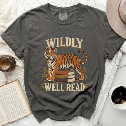 Charcoal t-shirt with tiger, books, and text "WILDLY WELL READ" graphic.