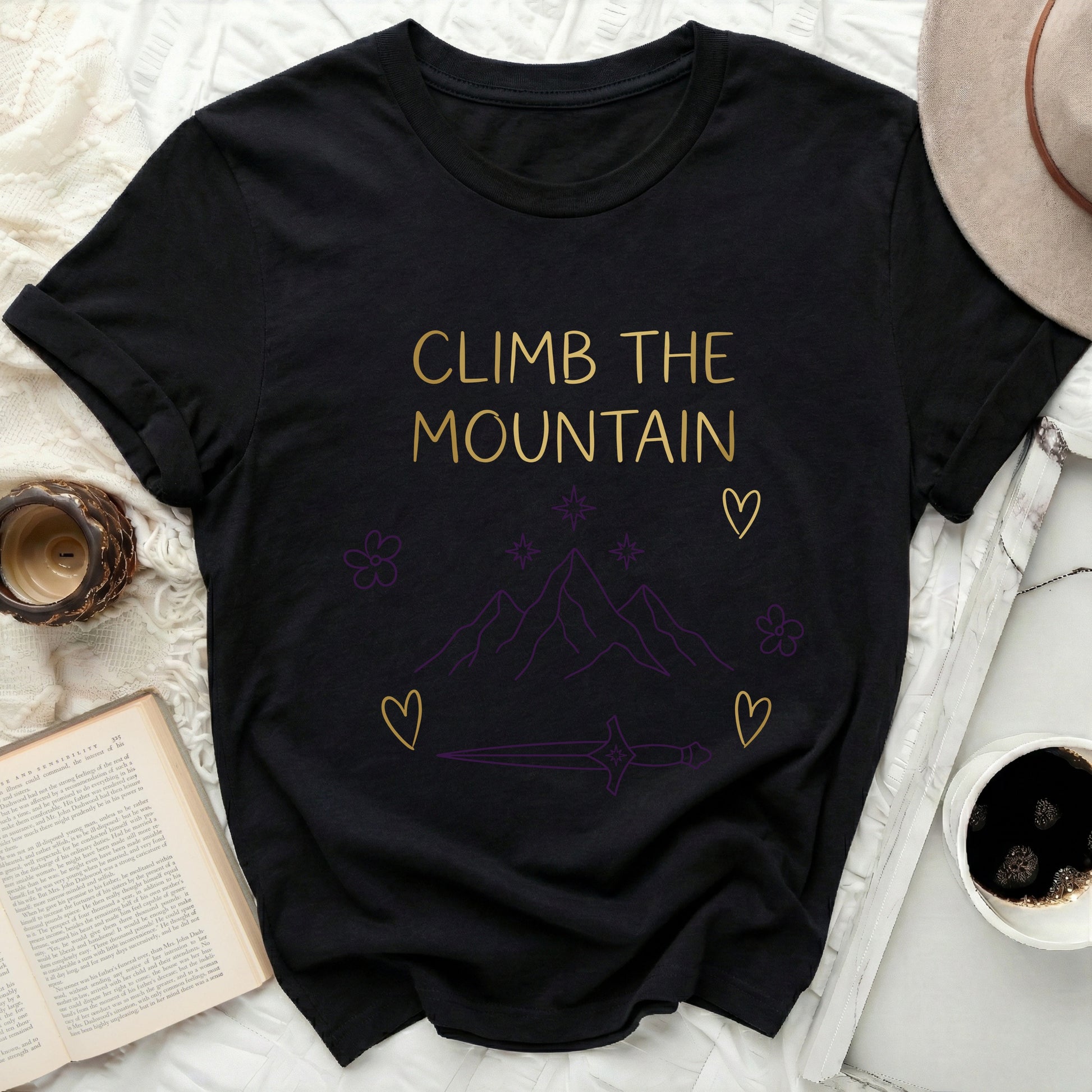 Black Climb The Mountain Adventure Design product type
Climb The Mountain
Mountain Graphic
Adventure Shirt
Nature Inspired
Hiking Tee
Outdoors Apparel
Inspirational Quote
Motivational Design
Dagger Symbol
Star Graphic
Flower Art
Heart Details
Black Top
Gold Lettering
Purple Accents
Graphic Tee
Explore More
Wanderlust Style
Unique Gift
Goal Setter